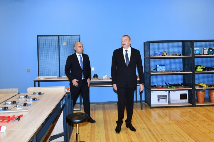 Prezident daha bir məktəbin açılışına qatılıb -